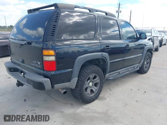 2004 Chevrolet Tahoe Z71 with VIN 1GNEK13Z54R126962, listed as a IAAI auction lot 43409908 with 260,171 mi miles and . Bid and sale history available at DreamBid. Image 4.