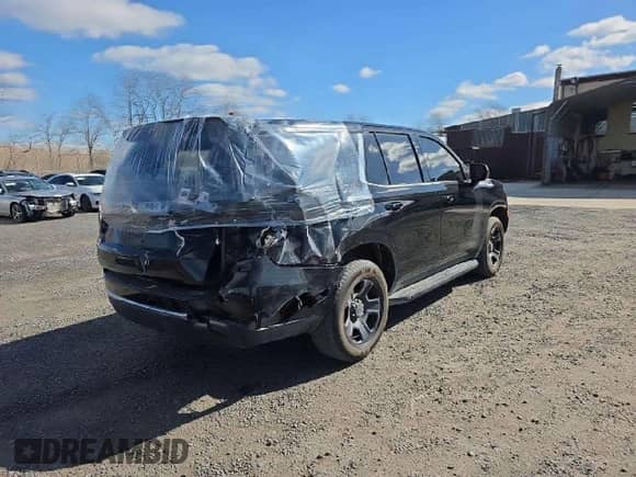 2022 Chevrolet Tahoe Commercial with VIN 1GNSKLED8NR178474, listed as a Copart auction lot 44544495 with 49,801 mi miles and Salvage title. Bid and sale history available at DreamBid. Image 4.