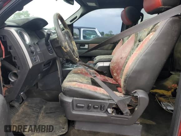 2014 Ford F-150 SVT Raptor z VIN 1FTFW1R64EFC92147, wystawiony jako Copart lot #69874965 z przebiegiem 97 551 mil mil oraz Szkoda całkowita • Salvage title. Historia ofert i sprzedaży dostępna na DreamBid. Obrazek 7.