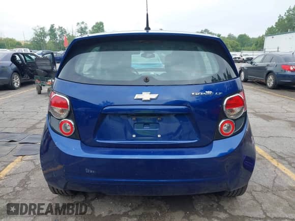 2012 Chevrolet Sonic LT z VIN 1G1JC6SH8C4209669, wystawiony jako IAAI lot #42671390 z przebiegiem 127 516 mil mil oraz . Historia ofert i sprzedaży dostępna na DreamBid. Obrazek 16.