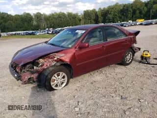 2006 Toyota Camry LE с VIN 4T1BF30K56U119797, выставлен на аукционе Copart как лот 70272095 с пробегом 214 851 миль миль и Списание • Salvage title. История ставок и продаж доступна на DreamBid. Изображение 1.