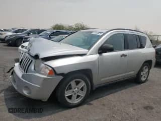 2007 Jeep Compass Sport with VIN 1J8FF47W57D185636, listed as a Copart auction lot 67310475 with 202,889 mi miles and Salvage title. Bid and sale history available at DreamBid. Image 1.