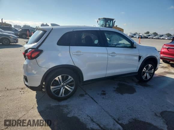 2021 Mitsubishi Outlander SE z VIN JA4APVAUXMU015757, wystawiony jako Copart lot #85944485 z przebiegiem 106 985 mil mil oraz Szkoda całkowita • Salvage title. Historia ofert i sprzedaży dostępna na DreamBid. Obrazek 3.