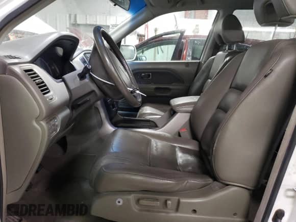 2006 Honda Pilot EX-L с VIN 5FNYF28646B045040, выставлен на аукционе Copart как лот 78414454 с пробегом 171 407 миль миль и Списание • Salvage title. История ставок и продаж доступна на DreamBid. Изображение 7.