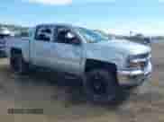 2018 Chevrolet Silverado 1500 LT z VIN 3GCUKREC0JG402410, wystawiony jako IAAI lot #43034711 z przebiegiem 73 836 mil mil oraz . Historia ofert i sprzedaży dostępna na DreamBid. Obrazek 1.