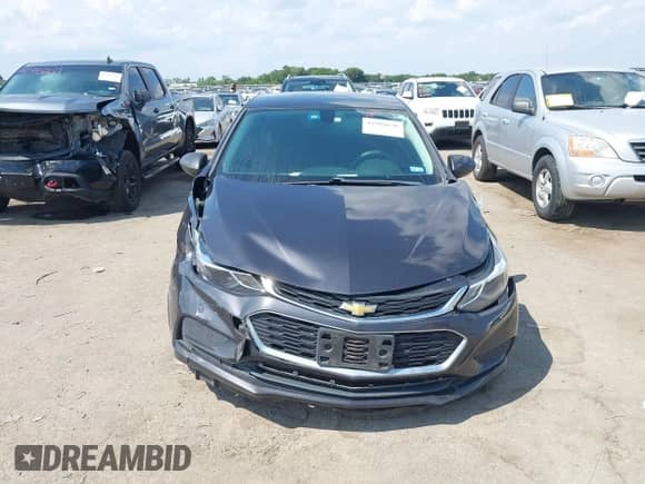 2016 Chevrolet Cruze LT z VIN 1G1BE5SM1G7288807, wystawiony jako IAAI lot #42988830 z przebiegiem 83 684 mil mil oraz . Historia ofert i sprzedaży dostępna na DreamBid. Obrazek 6.