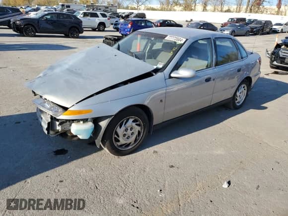 2000 Saturn LS z VIN 1G8JS52F0YY687243, wystawiony jako Copart lot #77773504 z przebiegiem 139 323 mil mil oraz Szkoda całkowita • Salvage title. Historia ofert i sprzedaży dostępna na DreamBid. Obrazek 1.