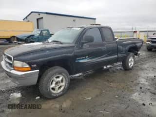 1997 Dodge Dakota with VIN 1B7GG23Y2VS152221, listed as a Copart auction lot 86370114 with 176,812 mi miles and Salvage title. Bid and sale history available at DreamBid. Image 1.