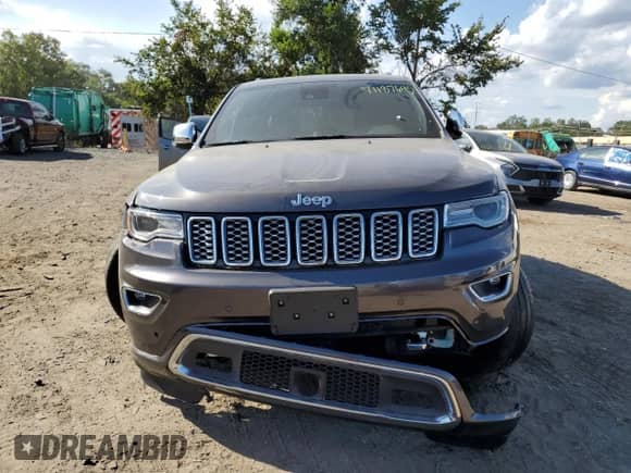 2017 Jeep Grand Cherokee Overland with VIN 1C4RJFCG3HC694208, listed as a Copart auction lot 71187645 with 67,455 mi miles and Salvage title. Bid and sale history available at DreamBid. Image 5.