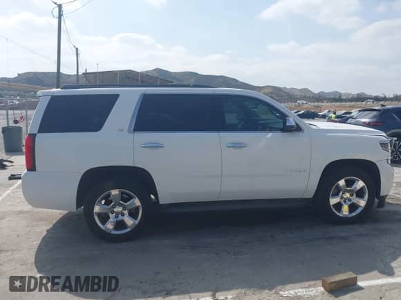 2015 Chevrolet Tahoe LS с VIN 1GNSCAEC7FR737717, выставлен на аукционе IAAI как лот 42110150 с пробегом 125 633 миль миль и . История ставок и продаж доступна на DreamBid. Изображение 13.