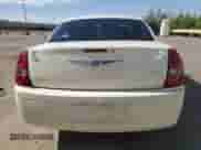 2009 Chrysler 300 LX with VIN 2C3KA43D49H577686, listed as a Copart auction lot 53002035 with 239,337 mi miles and Salvage title. Bid and sale history available at DreamBid. Image 6.