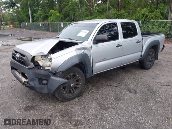2012 Toyota Tacoma with VIN 5TFJX4CN4CX016017, listed as a IAAI auction lot 42416542 with 116,900 mi miles and . Bid and sale history available at DreamBid. Image 2.