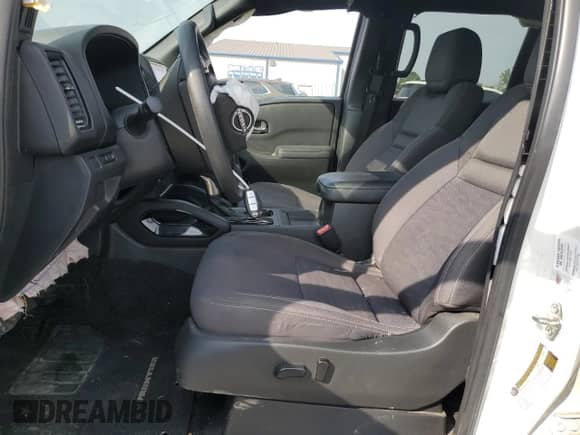 2023 Nissan Frontier Pro-X with VIN 1N6ED1EJ0PN607981, listed as a Copart auction lot 80810075 with 51,194 mi miles and Salvage title. Bid and sale history available at DreamBid. Image 7.