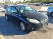 2014 Ford Focus Titanium with VIN 1FADP3J23EL211171, listed as a IAAI auction lot 43471214 with 142,101 mi miles and . Bid and sale history available at DreamBid. Image 1.