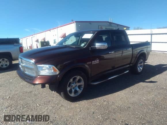 2015 Ram 1500 Laramie z VIN 1C6RR6NT5FS755037, wystawiony jako IAAI lot #41186422 z przebiegiem 128 774 mil mil oraz . Historia ofert i sprzedaży dostępna na DreamBid. Obrazek 23.