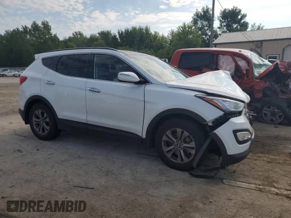 2015 Hyundai Santa Fe with VIN 5XYZUDLB0FG247103, listed as a Copart auction lot 69083285 with 175,820 mi miles and Salvage title. Bid and sale history available at DreamBid. Image 4.
