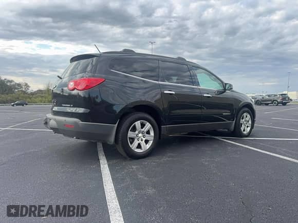 2009 Chevrolet Traverse 1LT с VIN 1GNEV23D79S123921, выставлен на аукционе Copart как лот 89722945 с пробегом 133 130 миль миль и Чистый • Clean title. История ставок и продаж доступна на DreamBid. Изображение 4.