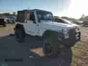 1999 Jeep Wrangler Sport with VIN 1J4FY19SXXP412760, listed as a Copart auction lot 84983895 with 180,172 mi miles and Clean title. Bid and sale history available at DreamBid. Image 4.