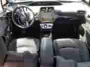 2018 Toyota Prius Plus z VIN JTDKARFP7J3099284, wystawiony jako Copart lot #58186915 z przebiegiem 51 694 mil mil oraz Szkoda całkowita • Salvage title. Historia ofert i sprzedaży dostępna na DreamBid. Obrazek 8.