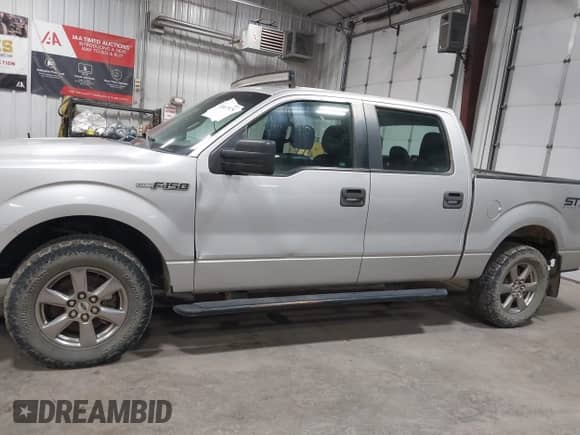 2014 Ford F-150 STX z VIN 1FTFW1EF8EKD60480, wystawiony jako IAAI lot #43467975 z przebiegiem 123 522 mil mil oraz . Historia ofert i sprzedaży dostępna na DreamBid. Obrazek 14.