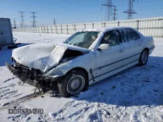 1998 BMW 7 Series 740iL with VIN WBAGJ8321WDM21490, listed as a Copart auction lot 42097355 with Not provided miles and Salvage title. Bid and sale history available at DreamBid. Image 1.