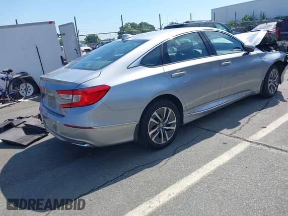 2021 Honda Accord EX-L with VIN 1HGCV3F57MA013218, listed as a IAAI auction lot 42657411 with 163,965 mi miles and . Bid and sale history available at DreamBid. Image 4.