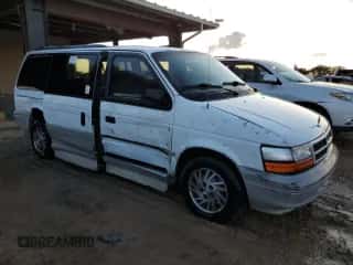 1995 Dodge Caravan with VIN 1B4GH54R1SX617718, listed as a Copart auction lot 79945724 with 107,165 mi miles and Salvage title. Bid and sale history available at DreamBid. Image 4.