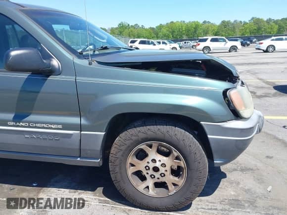 2002 Jeep Grand Cherokee с VIN 1J4GX38S12C244933, выставлен на аукционе IAAI как лот 42037931 с пробегом 171 201 миль миль и . История ставок и продаж доступна на DreamBid. Изображение 14.