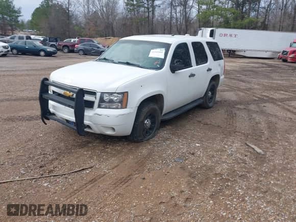 2009 Chevrolet Tahoe Commercial with VIN 1GNFK13009R251252, listed as a IAAI auction lot 41542068 with 214,333 mi miles and . Bid and sale history available at DreamBid. Image 2.