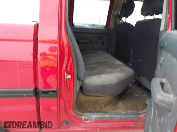 2002 Nissan Frontier SE with VIN 1N6ED29X72C328522, listed as a IAAI auction lot 42882409 with 230,086 mi miles and . Bid and sale history available at DreamBid. Image 8.