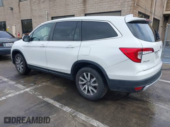 2020 Honda Pilot EX z VIN 5FNYF5H34LB019069, wystawiony jako IAAI lot #41538583 z przebiegiem 55 424 mil mil oraz . Historia ofert i sprzedaży dostępna na DreamBid. Obrazek 3.