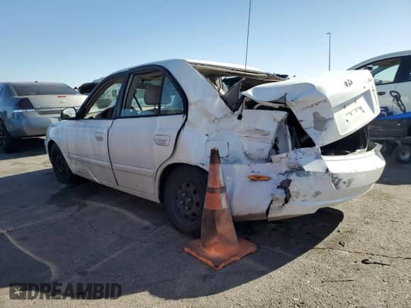 2003 Hyundai Accent GL z VIN KMHCG45C23U482563, wystawiony jako Copart lot #58358165 z przebiegiem 125 838 mil mil oraz Szkoda całkowita • Salvage title. Historia ofert i sprzedaży dostępna na DreamBid. Obrazek 2.