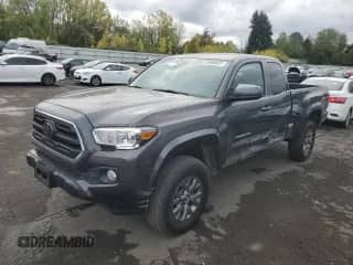 2019 Toyota Tacoma SR с VIN 5TFSX5ENXKX066068, выставлен на аукционе Copart как лот 85006855 с пробегом 32 511 миль миль и Списание • Salvage title. История ставок и продаж доступна на DreamBid. Изображение 1.