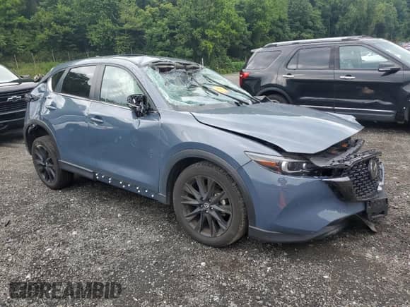 2023 Mazda CX-5 S Preferred z VIN JM3KFBCM5P0199095, wystawiony jako Copart lot #67264225 z przebiegiem 7 969 mil mil oraz Szkoda całkowita • Salvage title. Historia ofert i sprzedaży dostępna na DreamBid. Obrazek 4.
