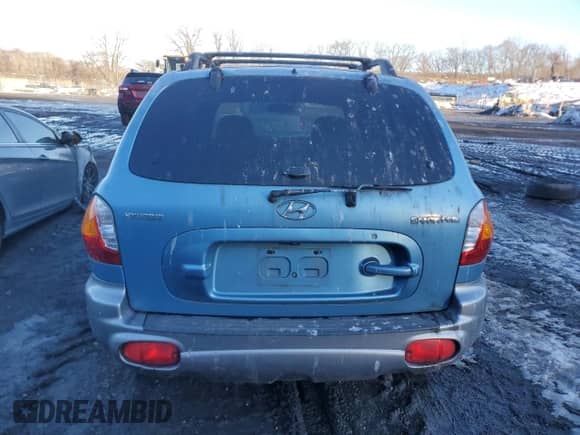 2004 Hyundai Santa Fe z VIN KM8SB12B54U713185, wystawiony jako Copart lot #44989775 z przebiegiem 84 866 mil mil oraz Czysty tytuł • Clean title. Historia ofert i sprzedaży dostępna na DreamBid. Obrazek 6.