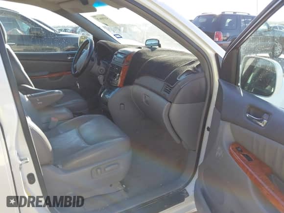 2009 Toyota Sienna XLE with VIN 5TDZK22CX9S232491, listed as a IAAI auction lot 43389674 with 298,733 mi miles and . Bid and sale history available at DreamBid. Image 5.