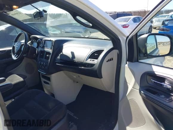 2015 Dodge Grand Caravan SE Plus with VIN 2C4RDGBG6FR653543, listed as a IAAI auction lot 41909408 with 69,669 mi miles and . Bid and sale history available at DreamBid. Image 5.
