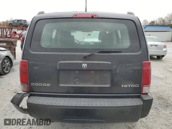 2009 Dodge Nitro SXT с VIN 1D8GU28K59W527001, выставлен на аукционе Copart как лот 77988964 с пробегом 157 787 миль миль и Списание • Salvage title. История ставок и продаж доступна на DreamBid. Изображение 6.