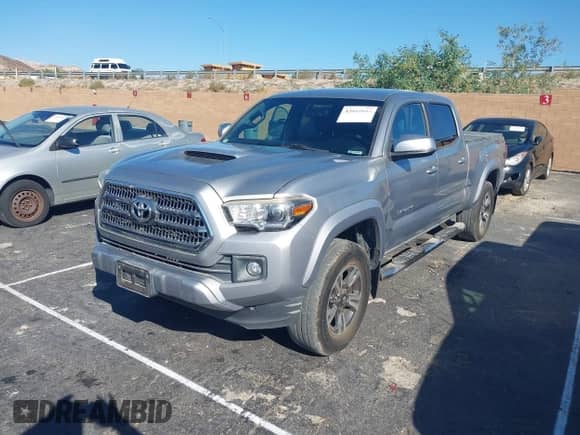 2017 Toyota Tacoma SR5 with VIN 3TMBZ5DNXHM006608, listed as a IAAI auction lot 43412044 with 114,937 mi miles and . Bid and sale history available at DreamBid. Image 2.