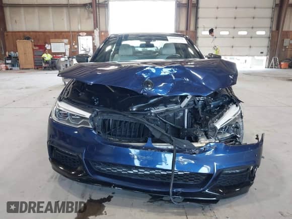 2019 BMW 5 Series 540i with VIN WBAJE5C52KWW10554, listed as a IAAI auction lot 42585059 with 71,082 mi miles and . Bid and sale history available at DreamBid. Image 12.
