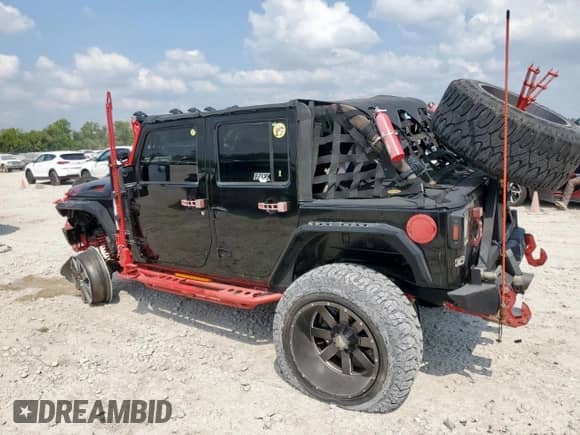 2007 Jeep Wrangler Unlimited Sahara z VIN 1J8GA59117L140502, wystawiony jako Copart lot #81340765 z przebiegiem 151 028 mil mil oraz Szkoda całkowita • Salvage title. Historia ofert i sprzedaży dostępna na DreamBid. Obrazek 2.