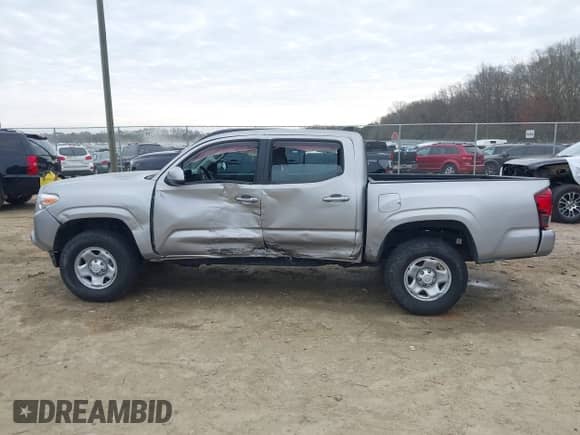2018 Toyota Tacoma SR with VIN 3TMCZ5AN4JM130307, listed as a IAAI auction lot 41541477 with 74,369 mi miles and . Bid and sale history available at DreamBid. Image 15.