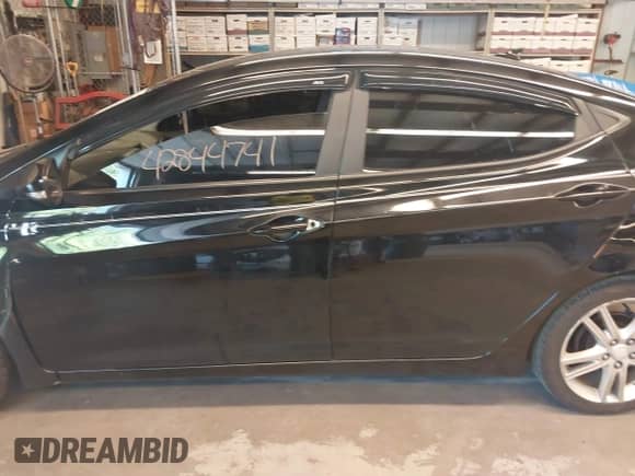 2012 Hyundai Elantra Limited z VIN KMHDH4AE2CU283277, wystawiony jako IAAI lot #42844741 z przebiegiem 113 812 mil mil oraz . Historia ofert i sprzedaży dostępna na DreamBid. Obrazek 14.