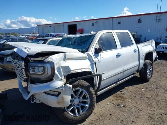 2018 GMC Sierra 1500 Denali with VIN 3GTU2PEJ8JG370518, listed as a IAAI auction lot 43359463 with Not provided miles and . Bid and sale history available at DreamBid. Image 2.