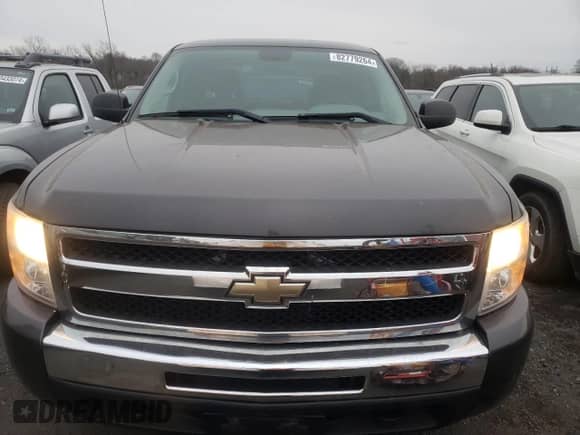 2010 Chevrolet Silverado 1500 Work Truck with VIN 1GCSKPE38AZ266054, listed as a Copart auction lot 82779264 with 154,528 mi miles and Salvage title. Bid and sale history available at DreamBid. Image 5.