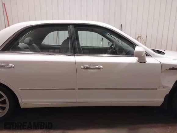 2002 Hyundai XG L z VIN KMHFU45EX2A180204, wystawiony jako IAAI lot #41472564 z przebiegiem 148 333 mil mil oraz . Historia ofert i sprzedaży dostępna na DreamBid. Obrazek 13.