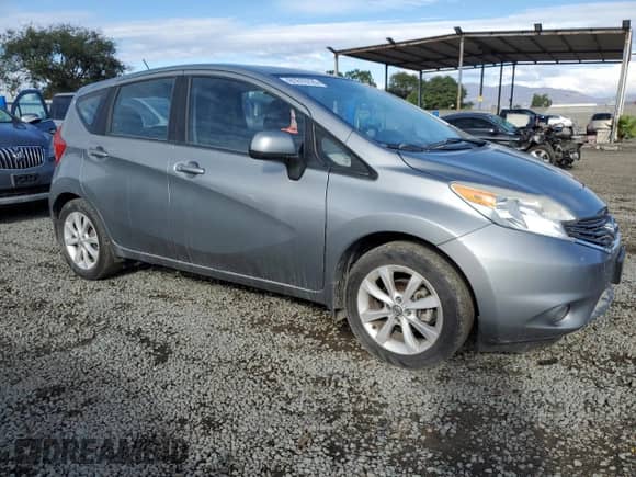 2014 Nissan Note S with VIN 3N1CE2CP9EL357628, listed as a Copart auction lot 81619725 with 104,060 mi miles and Salvage title. Bid and sale history available at DreamBid. Image 4.