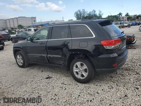 2017 Jeep Grand Cherokee Laredo с VIN 1C4RJEAG7HC877933, выставлен на аукционе Copart как лот 69581795 с пробегом 171 348 миль миль и Списание • Salvage title. История ставок и продаж доступна на DreamBid. Изображение 2.