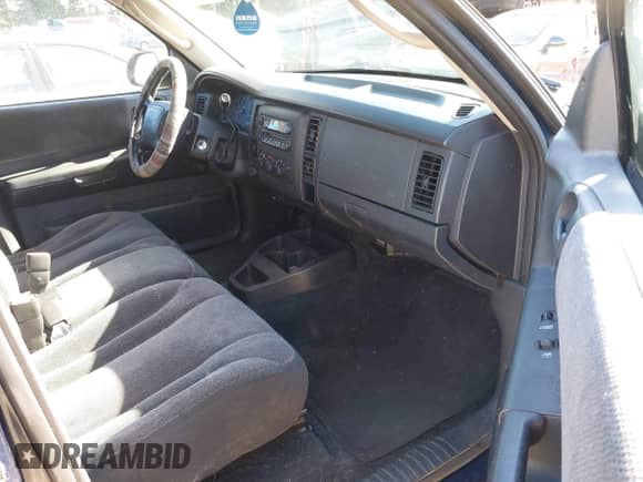 2003 Dodge Dakota Sport with VIN 1D7HG38X53S138620, listed as a IAAI auction lot 42337567 with 201,081 mi miles and . Bid and sale history available at DreamBid. Image 5.