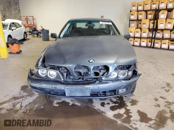 2000 BMW 5 Series 528i с VIN WBADM6346YGU10891, выставлен на аукционе Copart как лот 70666265 с пробегом Не указан миль и Списание • Salvage title. История ставок и продаж доступна на DreamBid. Изображение 5.